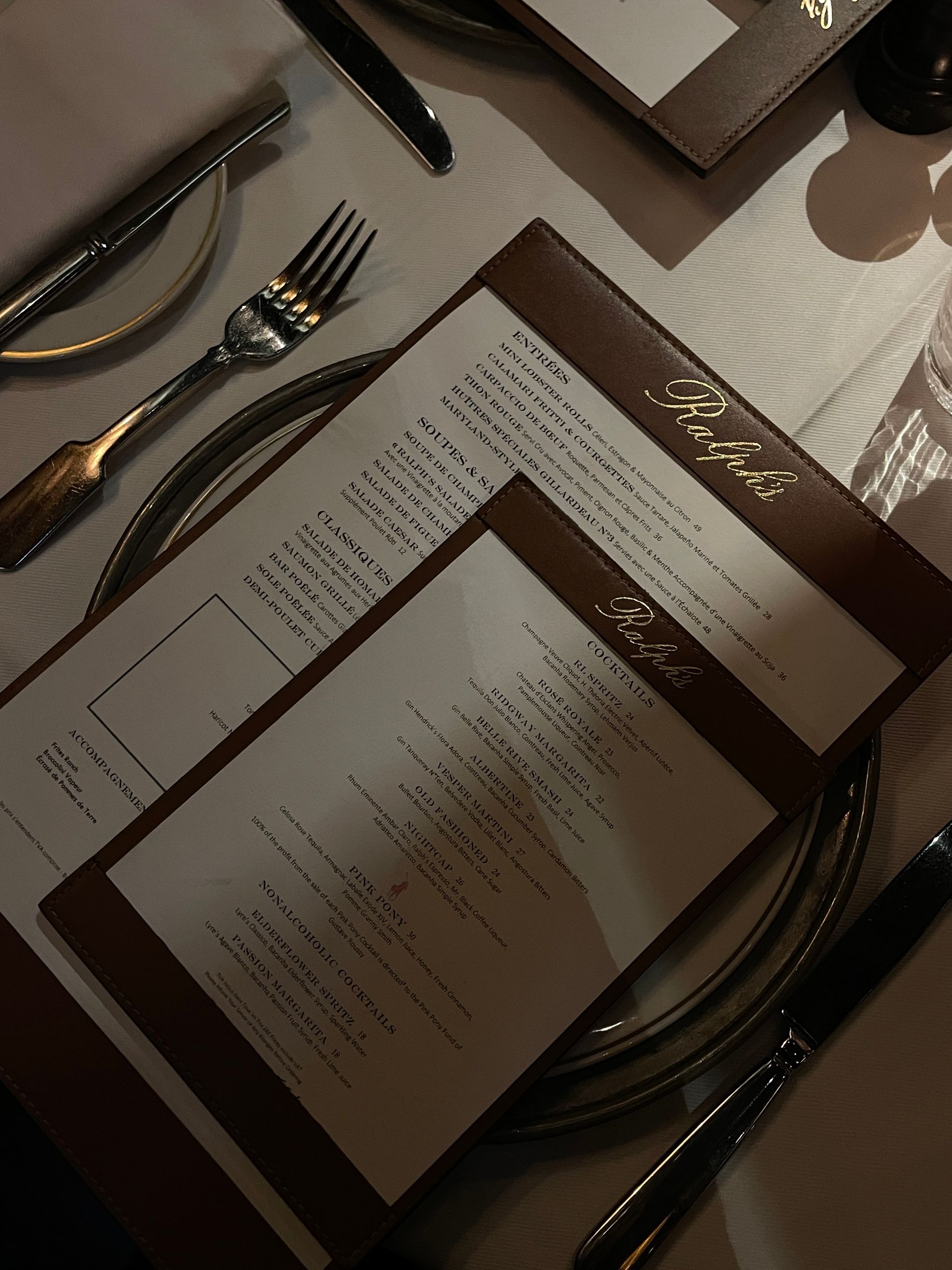 Printed restaurant menus on a table
