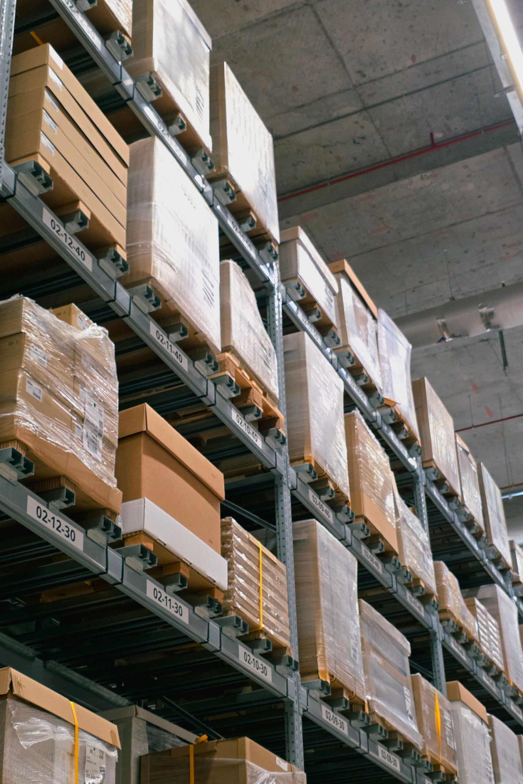 Cartons stacked on warehouse pallet racking