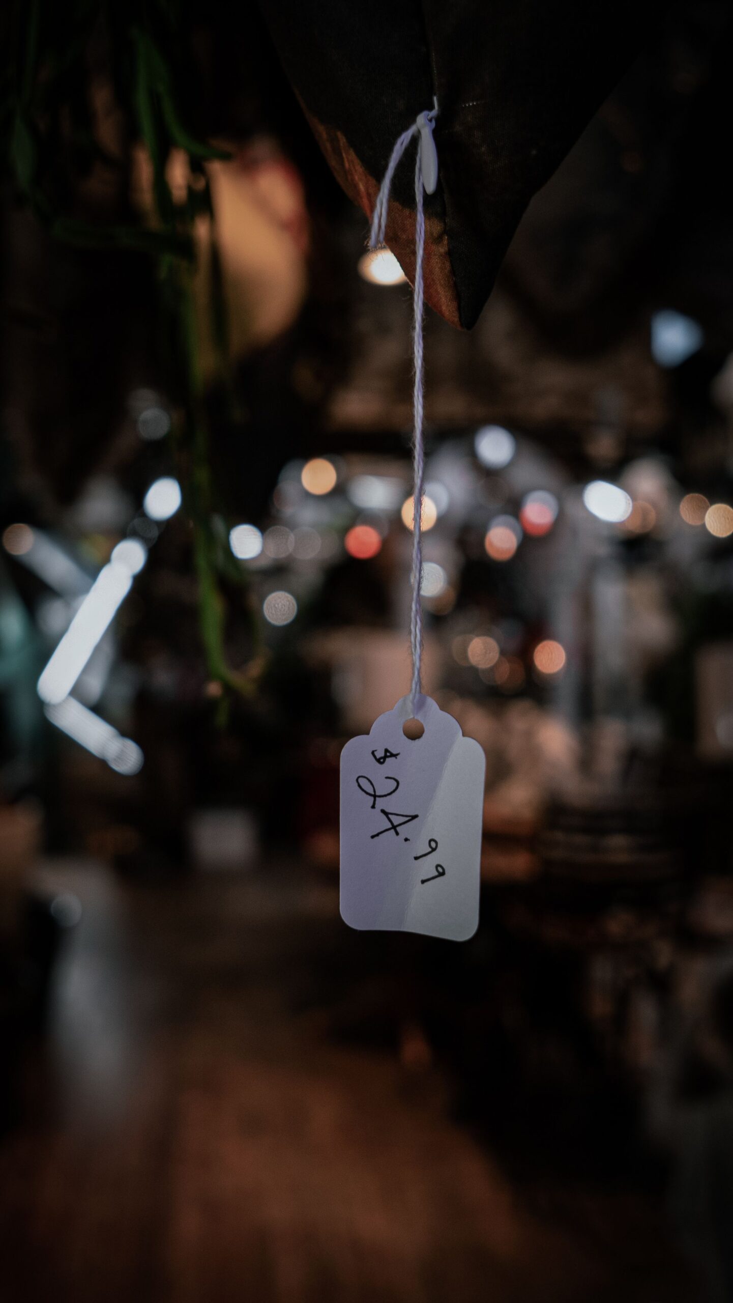 Paper price tag on a dark background